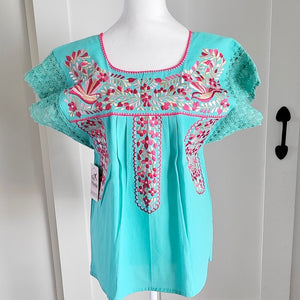 PUEBLA EMBROIDERED BLOUSE -  TEAL WITH LILAC AND DARK PINK